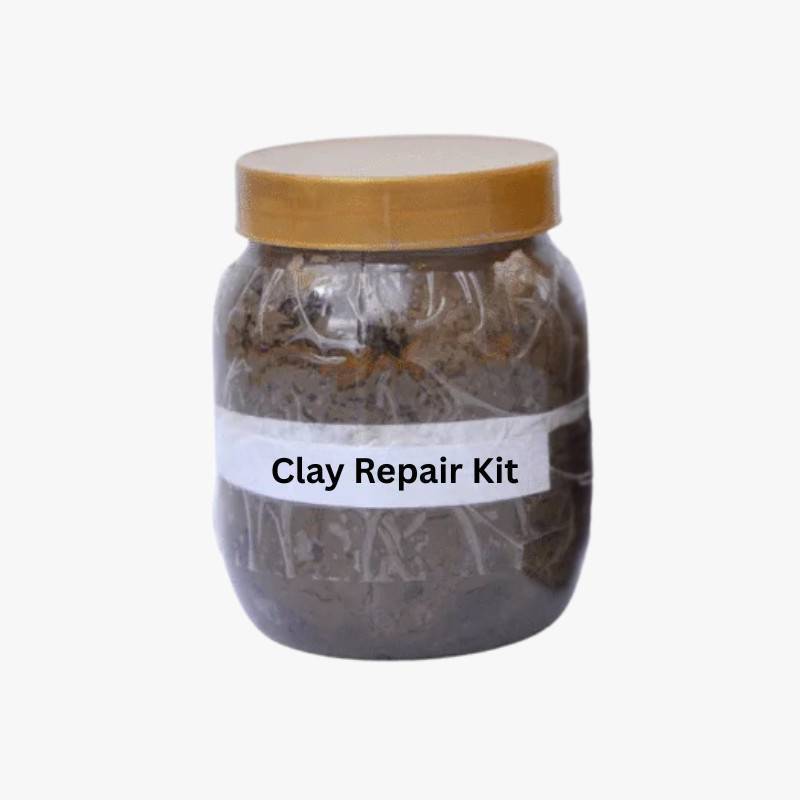 Tandoor Clay Pot Repair Kit AS08 – clear glass jar with gold lid filled with grey-brown repair clay mixture, showing white label reading Clay Repair Kit, on light grey background